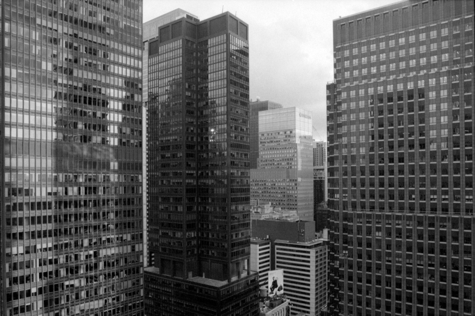 advertising billboard among skyscrapers in manhattan