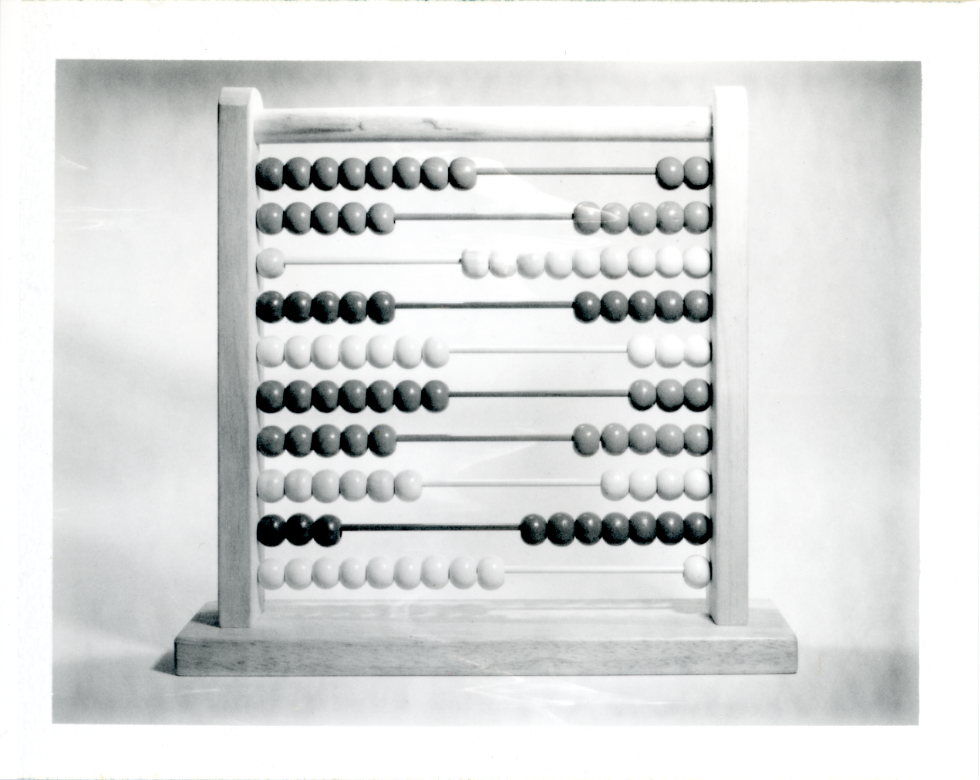 scan of original photograph UR-118_FP10A showing an abacus